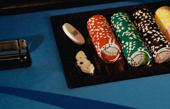 Pai Gow Poker dragon button placed in the rack