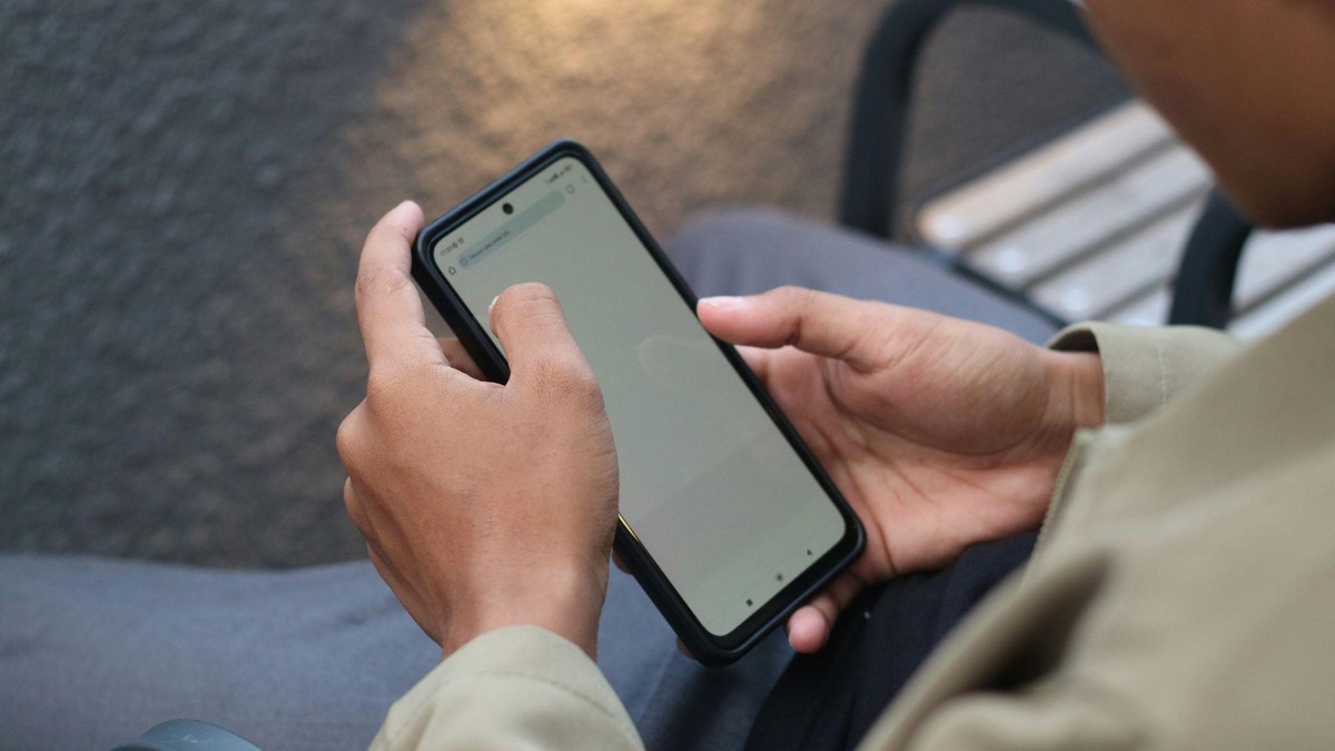 person is using their phone