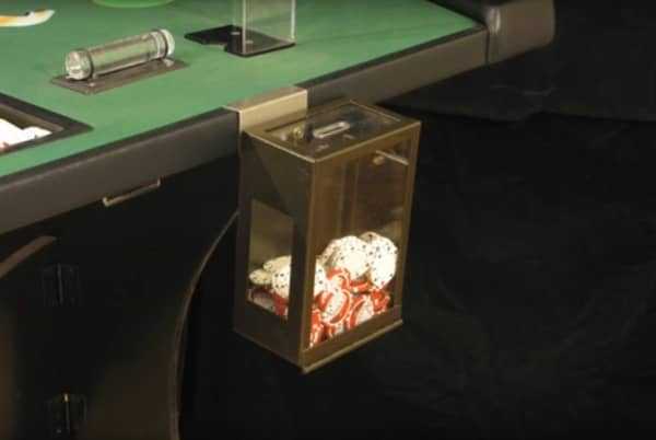 Toke box hanging off the side of the table Toke box hanging off the side of the table