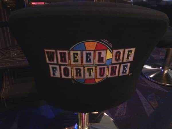 The Wheel of Fortune logo on the back of a chair The Wheel of Fortune logo on the back of a chair