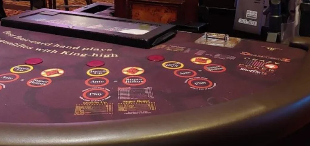 A close-up of the Crazy 4 Poker layout